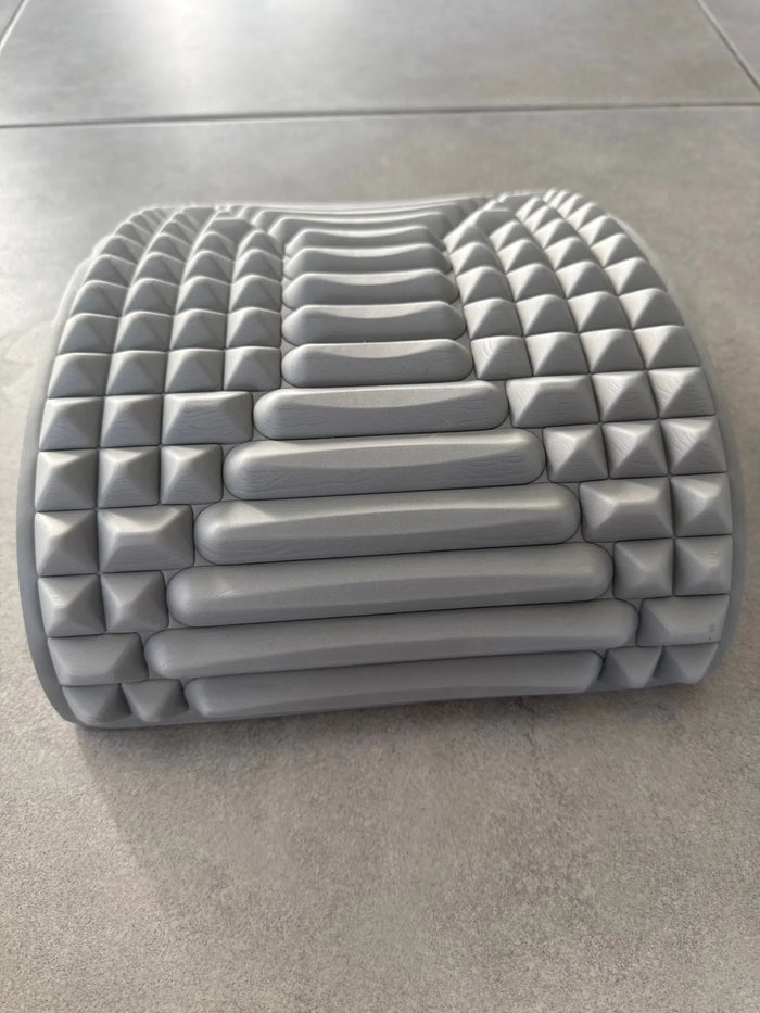 Buyer photo of the grey arch resting on a tiled floor