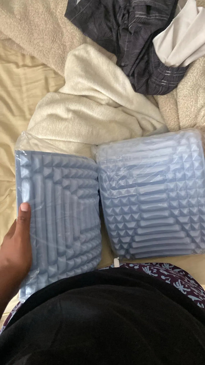 Buyer photo of two arches still in their delivery wrapping